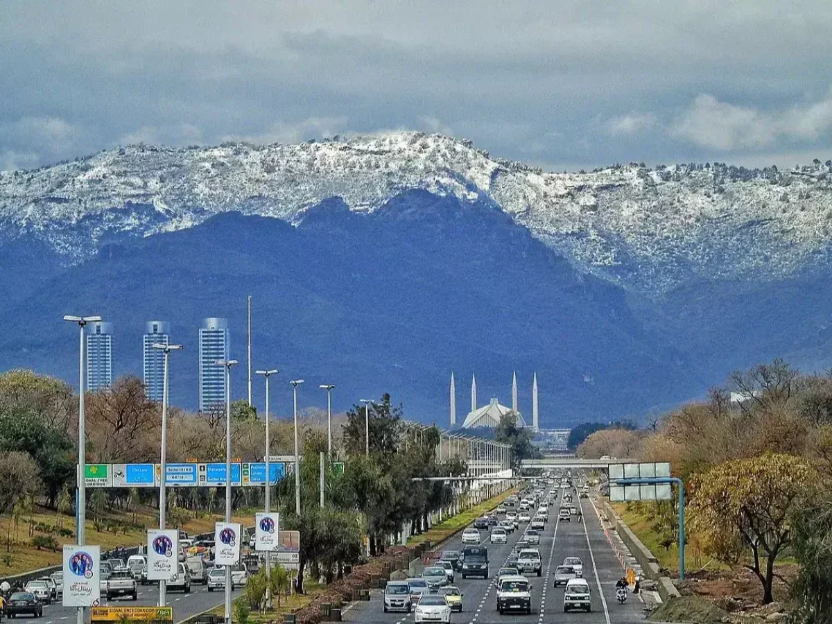 Islamabad city view with Faisal Mosque and the Margalla Hills